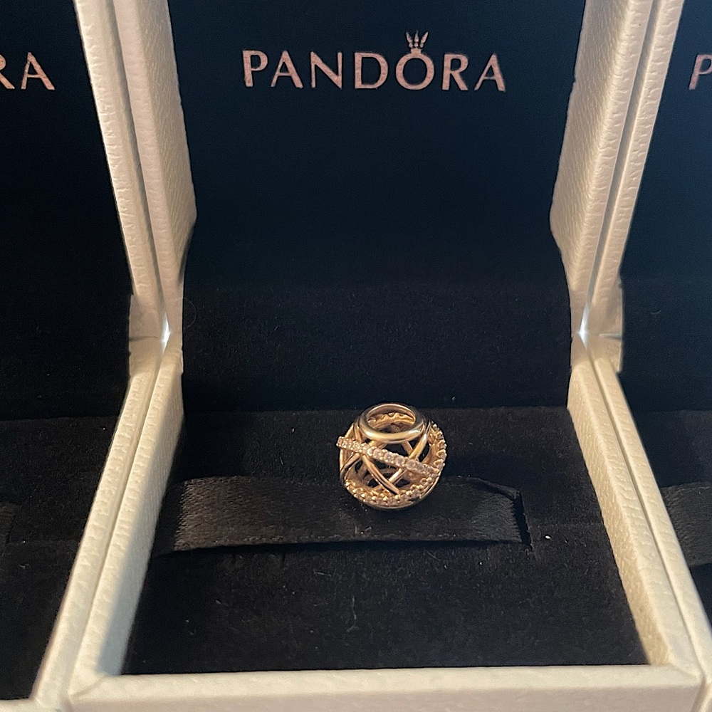 Pandora 18k gold plated galaxy openwork charm